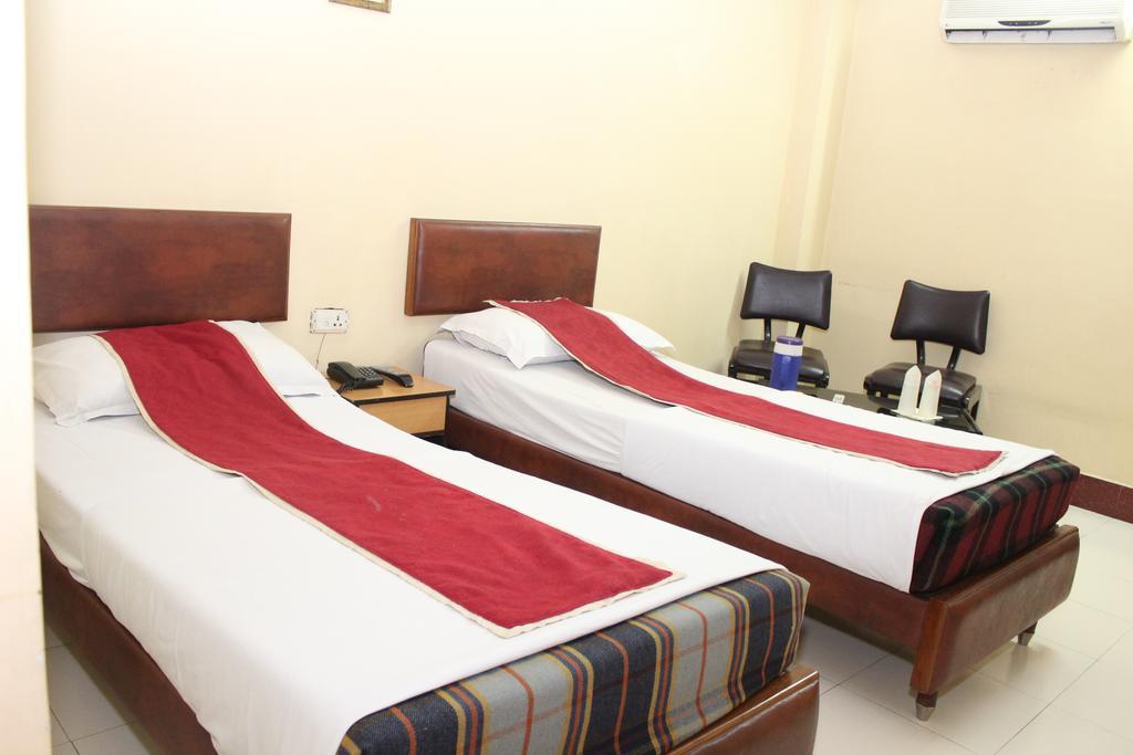 Hotel Bengal International Sziliguri Szoba fotó