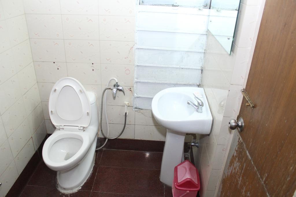 Hotel Bengal International Sziliguri Szoba fotó
