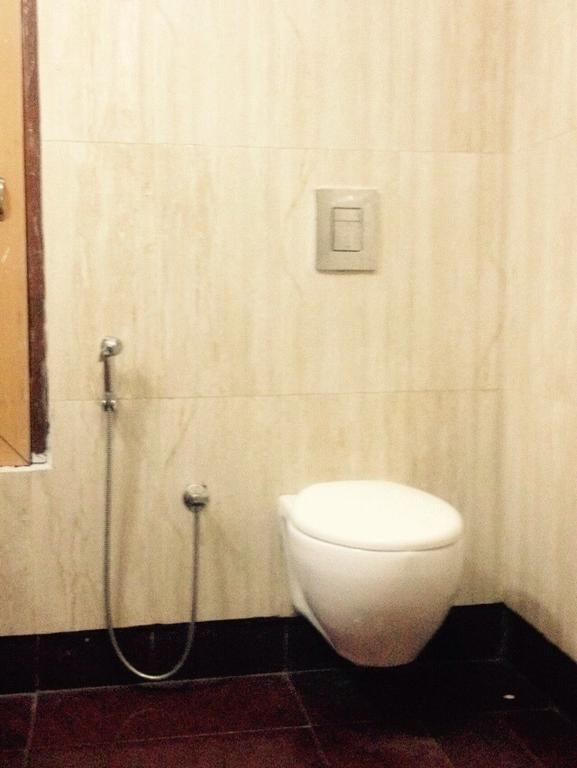 Hotel Bengal International Sziliguri Szoba fotó