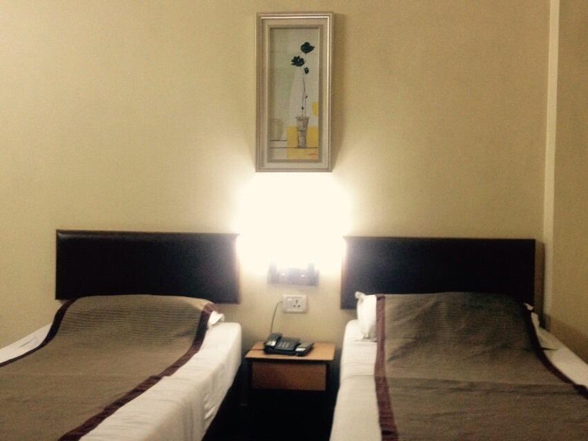 Hotel Bengal International Sziliguri Szoba fotó