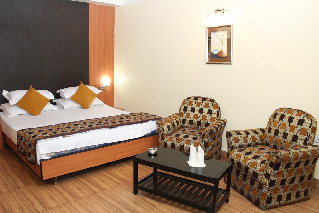 Hotel Bengal International Sziliguri Szoba fotó