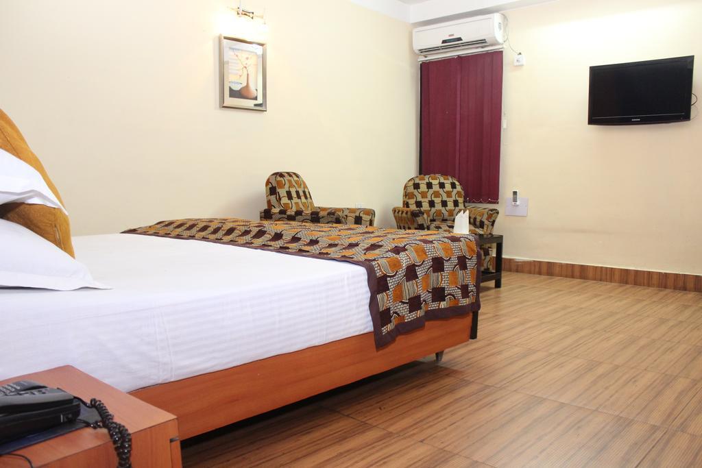 Hotel Bengal International Sziliguri Szoba fotó
