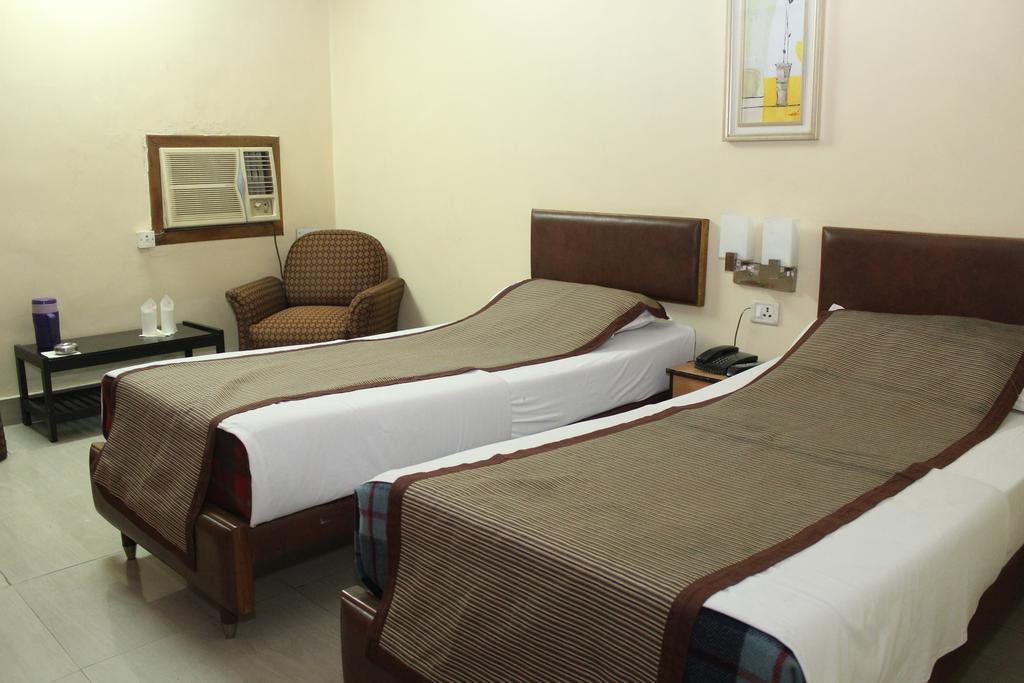 Hotel Bengal International Sziliguri Szoba fotó
