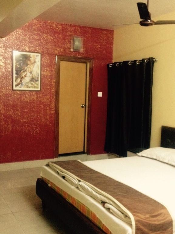 Hotel Bengal International Sziliguri Szoba fotó